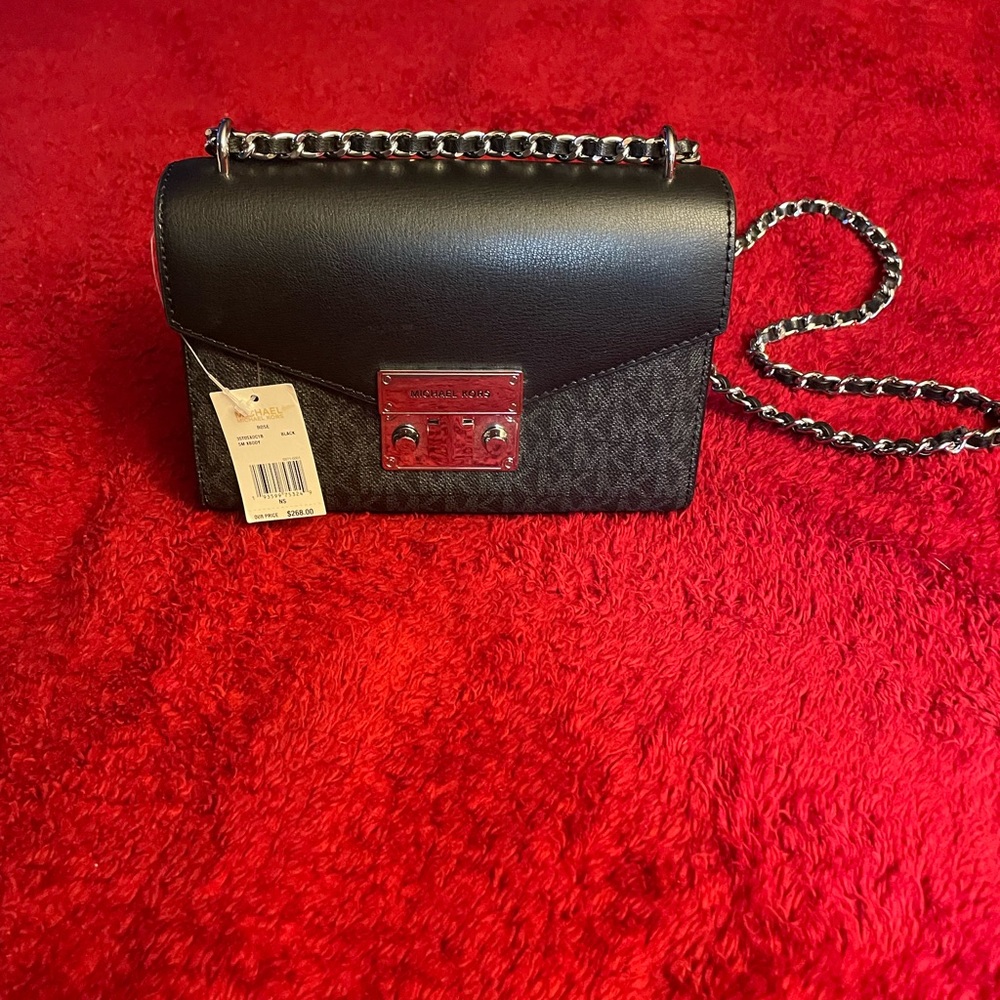 Michael Kors black and silver small crossbody bag new with tags.